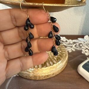 14k yellow gold with onix cabochone.